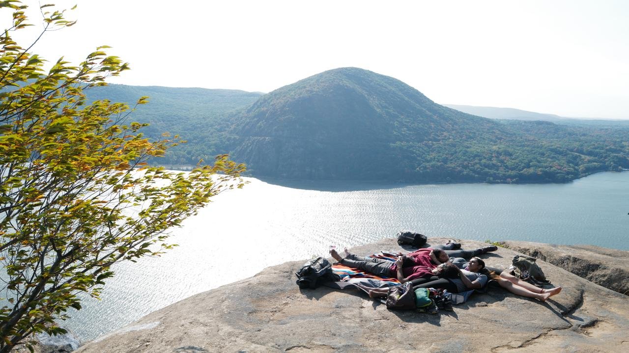Hudson Highlands State Park Preserve Hikers at Hudson Highlands State Park Preserve relaxing on cliff overlooking river